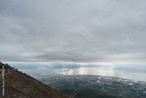 View from the top of Mount Vesuvius down to the city of Pompeii on a cloudy winter day, Naples, Campania, Italy