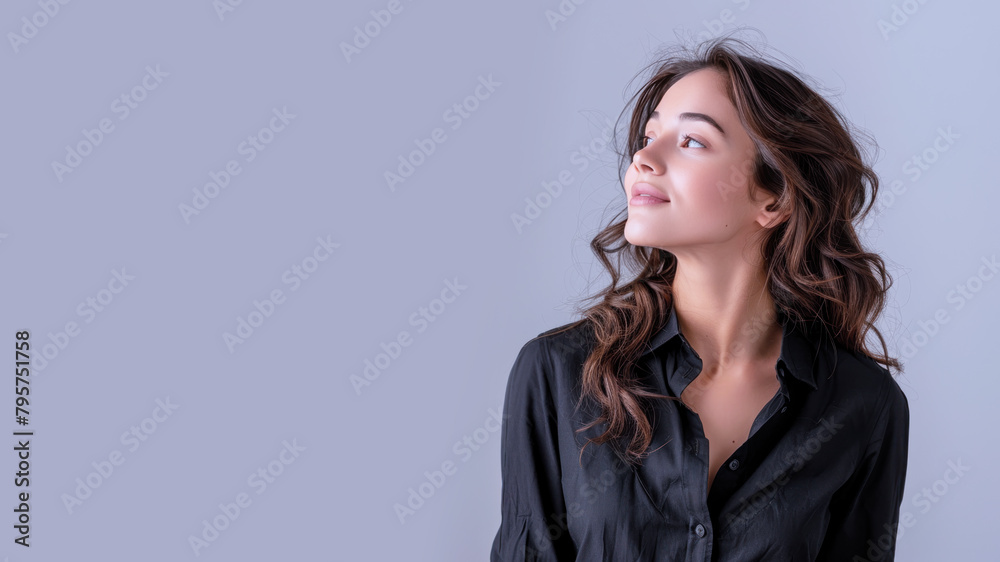 Side view of Brunette businesswoman wearing black shirt, smiling candid