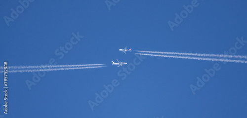 Two Commercial Airliners Pass Each Other at High Altitude