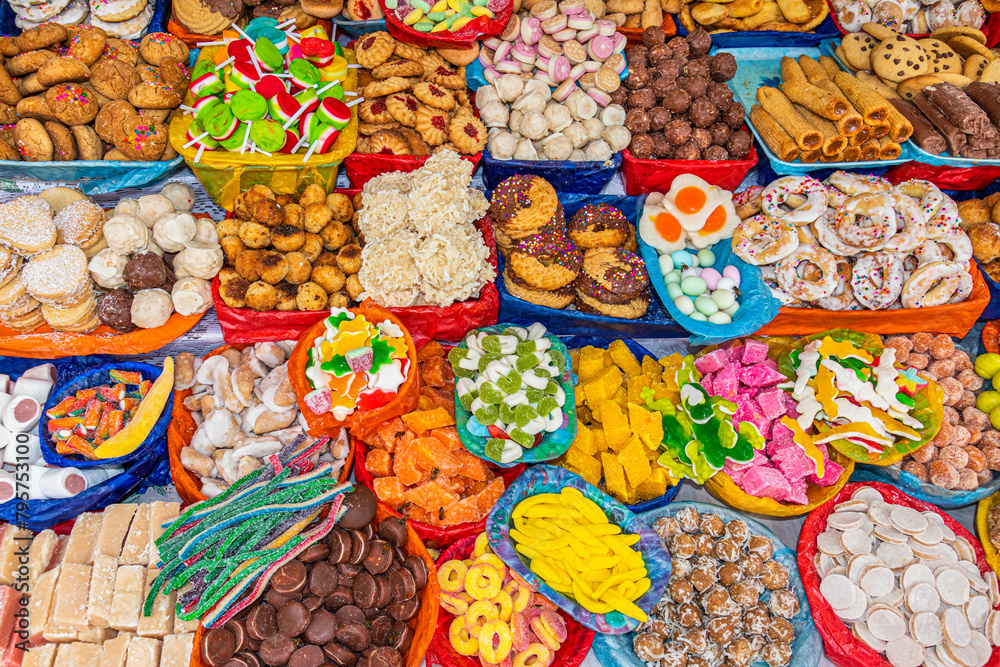 Sweets in a wide variety of flavors, shapes, colors and traditional preparation methods are displayed on numerous stands during the Catholic celebration of Corpus Christi in Cuenca, Ecuador