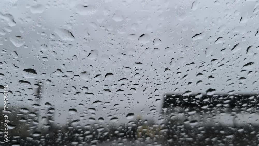 The raindrops on the glass slowly fade The raindrops on the glass slowly fade