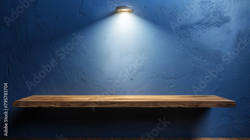 Perfect product display  wooden shelf against a textured blue wall lit by a single overhead spotlight
