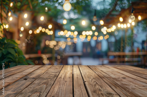 Festive cafe ambiance in the bokeh background of an empty wood table top