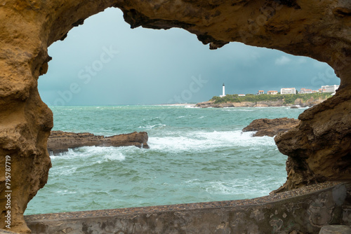 Coastal view through a rocky opening in Biarritz, France