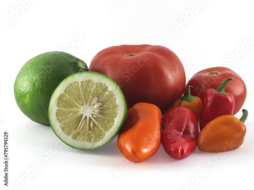 tomato, yellow pepper, green, natural lemon on white background