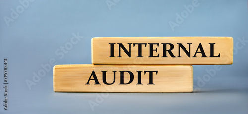 Wallpaper Mural INTERNAL AUDIT - words on wooden blocks on blue background Torontodigital.ca