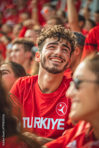 Turkish football soccer fans in a stadium supporting the national team, Ay-Yildizlilar  © PixelGallery