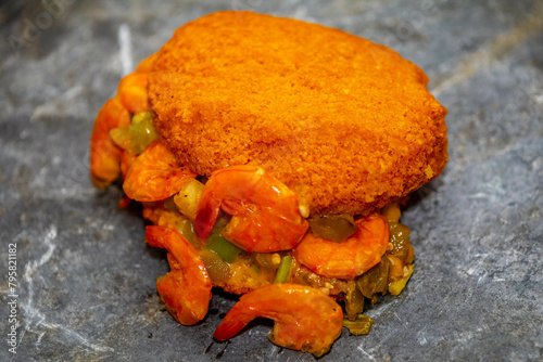 Traditional Brazilian acarajé, food of African origin based on vatapá, caruru and dry shrimp  photo