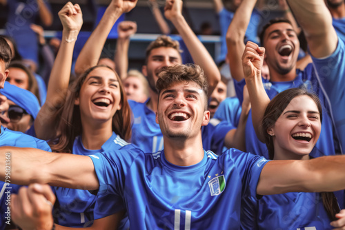 Italian football soccer fans in a stadium supporting the national team, Squadra Azzurra 