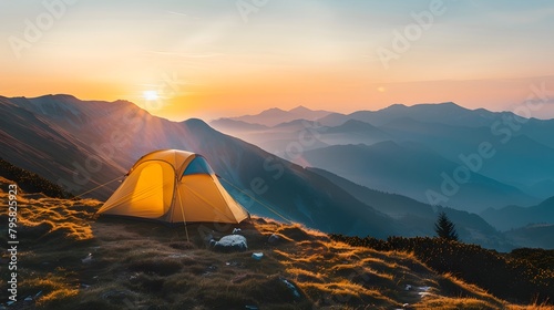 Yellow tent on the mountain in the morning. 