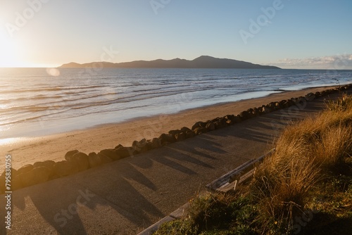 Beach front of Raumati. In the background is Kapiti Island. Paraparaumu, Wellinton, New Zealand. photo