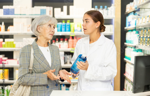 Female pharmacist consulting an elderly woman who wants to buy intimate hygiene items