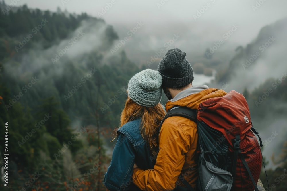 Affectionate couple enjoying a scenic hike together Affectionate couple enjoying a scenic hike together