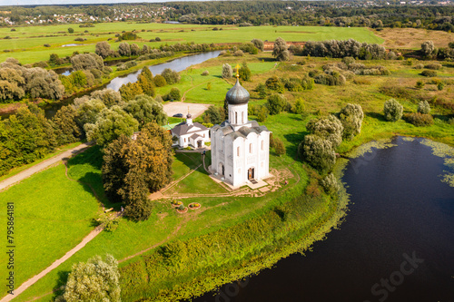Drone view of the ancient white-stone Church of the Intercession on the Nerl on a summer day, located in the Vladimir region, ..Russia photo