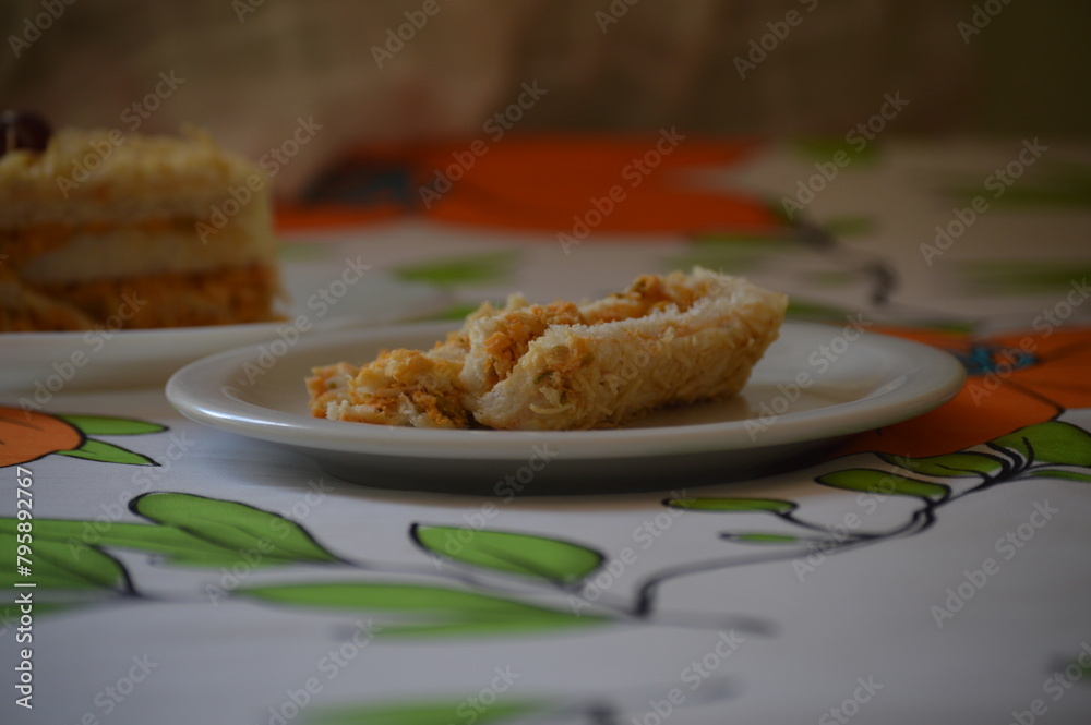 Cold chicken pie with bread and mashed potato topping on white porcelain plate with copy space