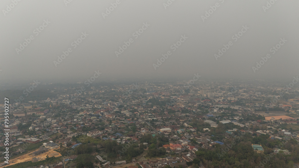 Aerial view of an environment in Chiang Rai city covered with bad air pollution such as PM 2.5.