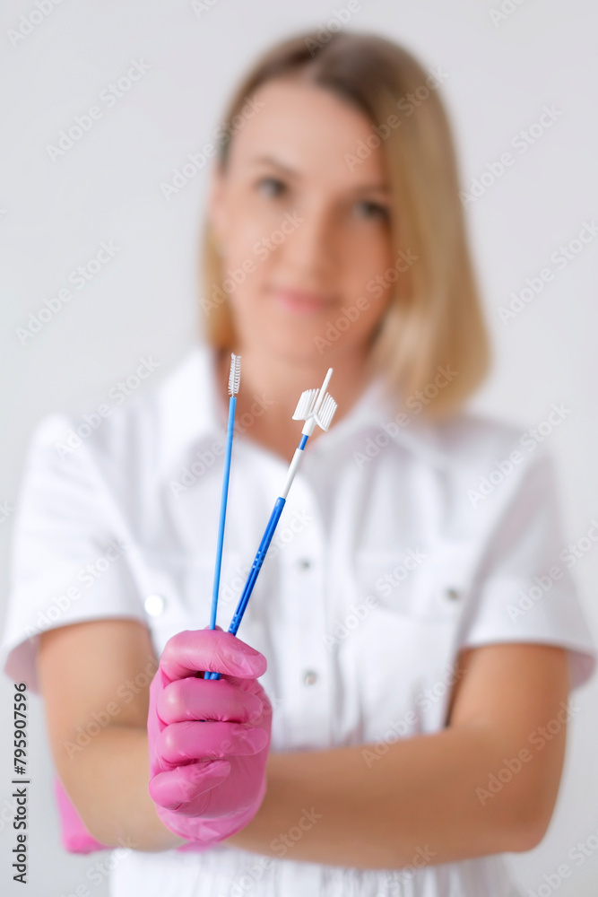 Close-up of gynecological instruments for taking a cytological smear from the cervical canal of the cervix Close-up of gynecological instruments for taking a cytological smear from the cervical canal of the cervix