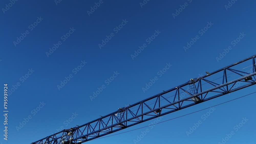 Aerial Flight Over a New Constructions Development Site in Vilnius, Lithuania. Urban Construction Site, Aerial View. High crane works on building site. Crane and building construction site. Aerial Flight Over a New Constructions Development Site in Vilnius, Lithuania. Urban Construction Site, Aerial View. High crane works on building site. Crane and building construction site.