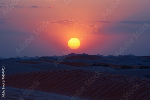 Sunset over the sand dunes in the Empty Quarter desert of Saudi Arabia