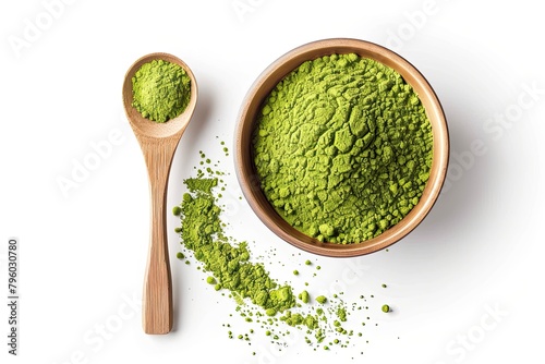 Wooden spoon with powdered matcha green tea in bowl, isolated on white 