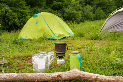 Tourist food. Cooking while camping. Tourist cuisine. Food and tent.