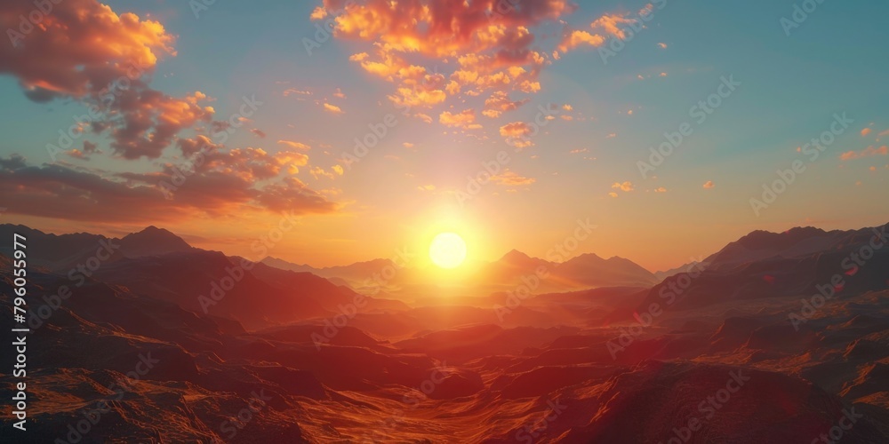 Beautiful sunset over mountain range with large sun in sky