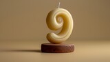 **A minimalist composition showcasing a birthday candle molded into the shape of the number 