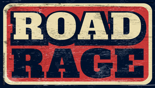 Aged and worn road rage sign on wood