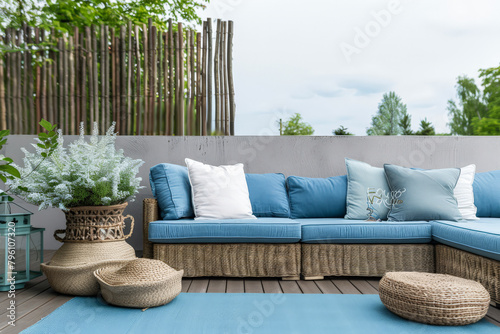 Serene home terrace decor with coastal tones and chic decor. Home design concept image.