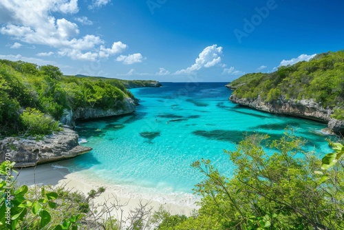 A hidden cove with turquoise water, white sand beach framed by lush vegetation, wide panoramic view