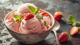 Delicious strawberry ice cream in a bowl