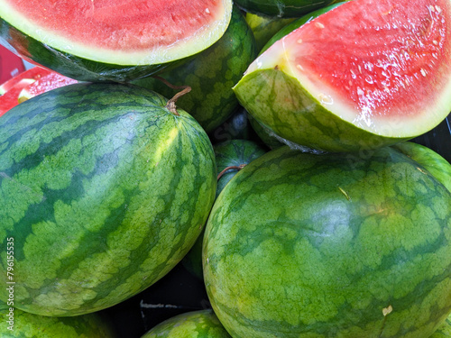 Watermelon in the market. Selective focus and shallow depth of field.