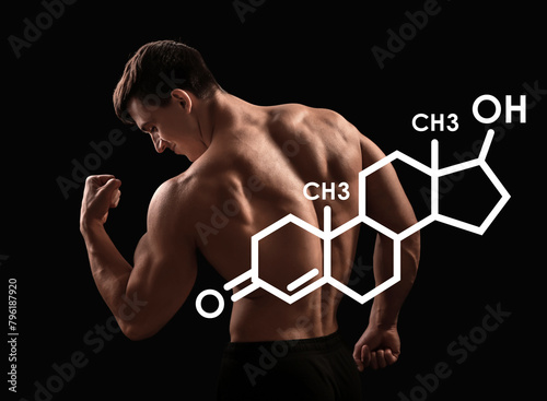 Muscular bodybuilder on dar...