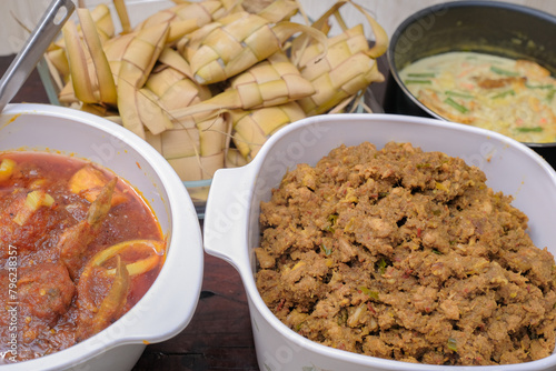 Obraz na płótnie Ketupat typical Hari Raya, served with Rendang, Lodeh, and Sambal Goreng . Special dishes during Eid al-Fitr, especially in Malaysia w salonie
