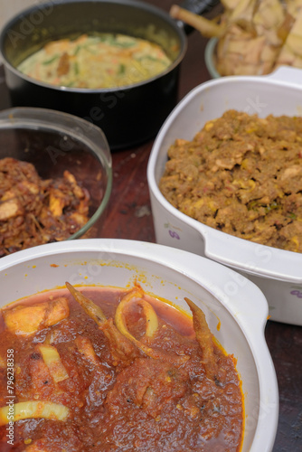 Obraz na płótnie Ketupat typical Hari Raya, served with Rendang, Lodeh, and Sambal Goreng . Special dishes during Eid al-Fitr, especially in Malaysia w salonie