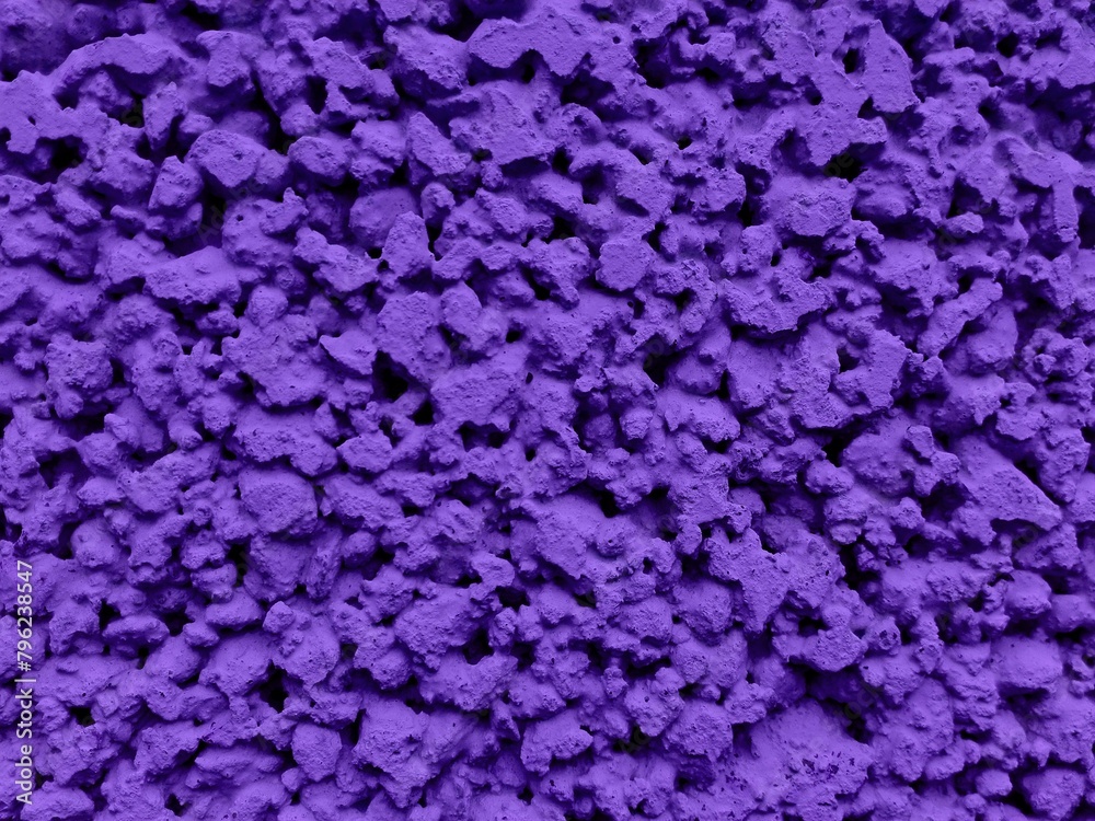 Violet painted stone wall or fence texture background. Beautiful ultra-violet gravel wall pattern. Textured house ground floor. Home colorful violet wall exterior design. Abstract new celebration fond Violet painted stone wall or fence texture background. Beautiful ultra-violet gravel wall pattern. Textured house ground floor. Home colorful violet wall exterior design. Abstract new celebration fond