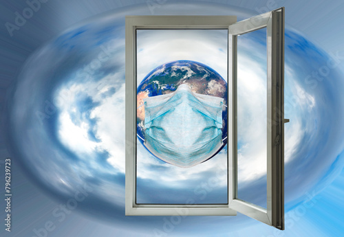  image of an open window through which you can see the globe on which a medical mask is worn