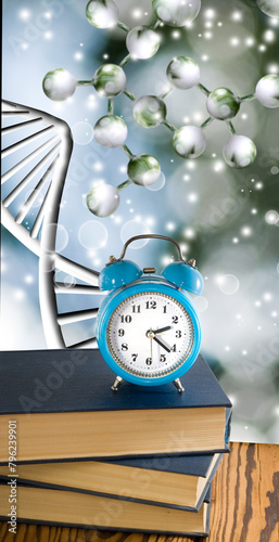  clock sitting on a stack of books against a background of stylized DNA strands.