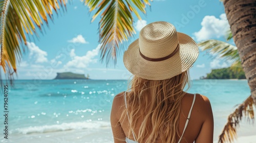 back view of woman on tropical beach