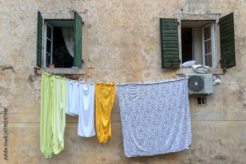 Laundry hangs on a line stretched between two windows in Kotor Old Town, Montenegro