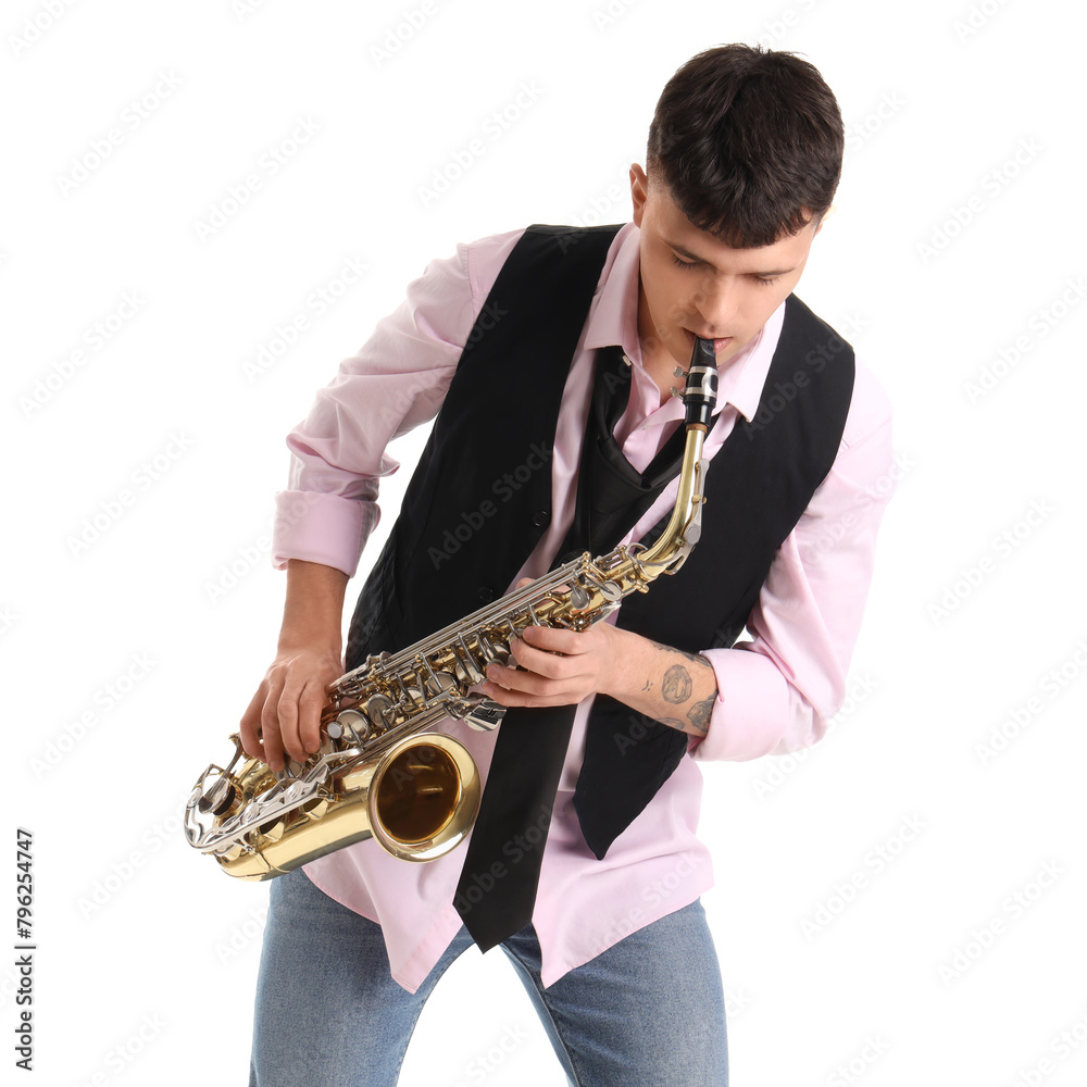 Naklejka premium Young man playing saxophone on white background
