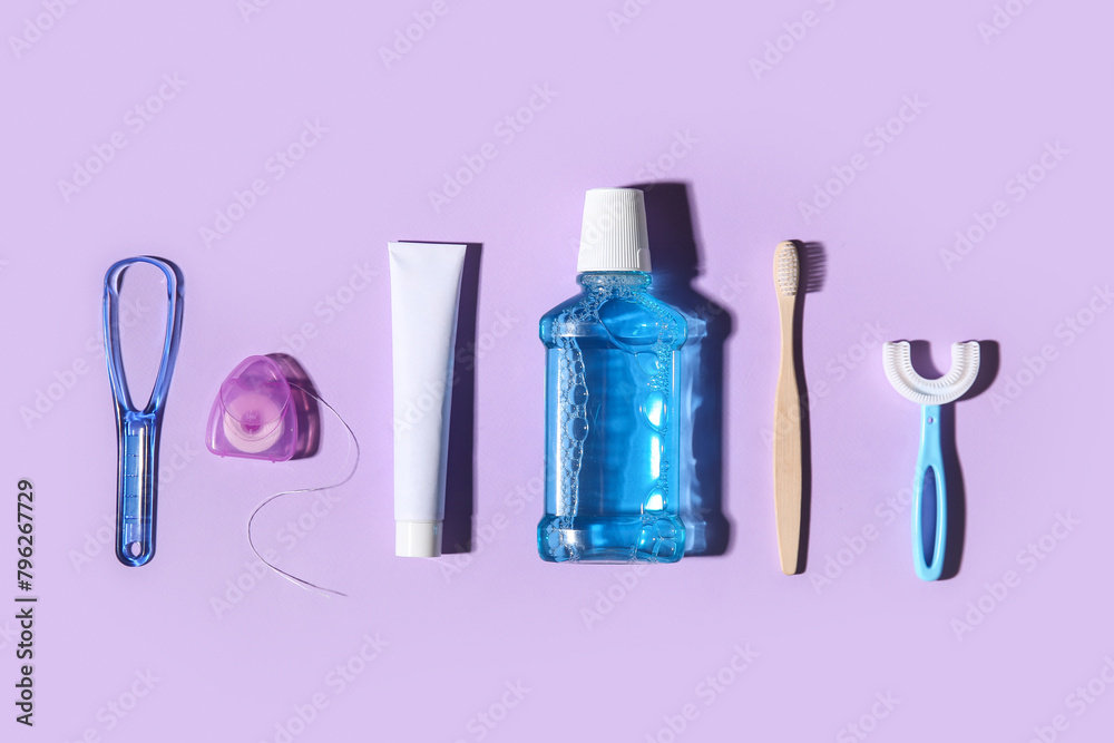 Set for oral hygiene on lilac background Set for oral hygiene on lilac background