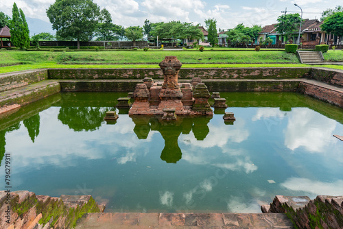 Trowulan, Indonesia - March 2, 2020. Tikus Temple is a temple inherited from the Majapahit kingdom. Tikus Temple is a place for bathing rituals and was built in the 14th century photo