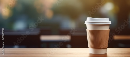 A coffee cup on a restaurant table photo