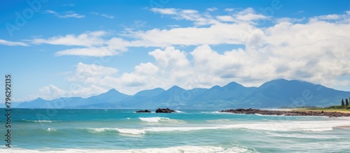 Beach with towering mountain backdrop