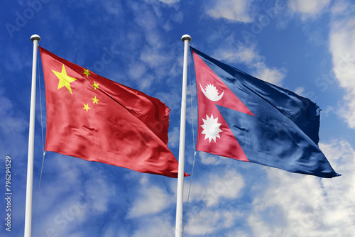 3d illustration. China and Nepal Flag waving in sky. High detailed waving flag. 3D render. Waving in sky. Flags fluttered in the cloudy sky.