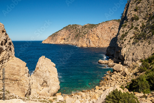 Beautiful small cove near Portitxol in the northern coast of Ibiza, Sant Joan de Labritja, Balearic Islands, Spain photo