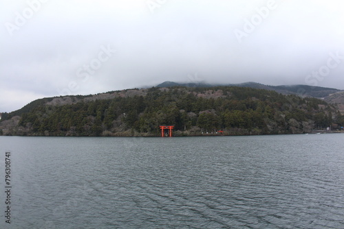 Traditional shrine gate near lake in japan