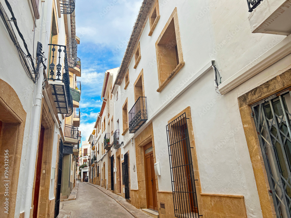 Fototapeta premium Old white house in the center of the village