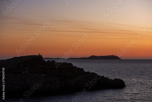 Beautiful sunset at Punta Galera cape, near Sant Antoni de Portmany, Ibiza, Balearic Islands, Spain photo